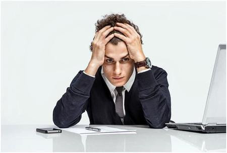frustrated at desk